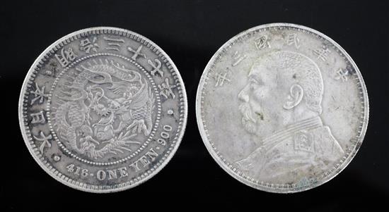 A Chinese Yuan Shi Kai silver dollar and a Japanese 1897 One Yen